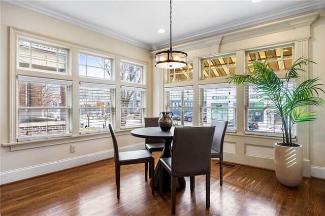 living room featuring dark hardwood / wood-style flooring, ceiling fan, and ornamental molding