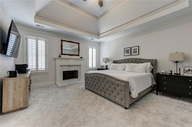 1892 Raven Hill Dr NE, Atlanta, GA 30319 - bedroom with a tray ceiling, multiple windows, light colored carpet, and ornamental molding