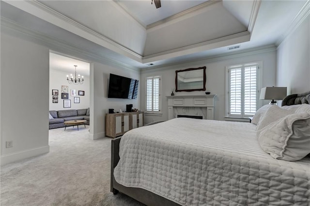 1892 Raven Hill Dr NE, Atlanta, GA 30319 - bedroom with ornamental molding, carpet, a tray ceiling, a chandelier, and a high end fireplace