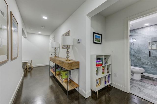 1892 Raven Hill Dr NE, Atlanta, GA 30319 - hall with finished concrete floors, recessed lighting, and baseboards
