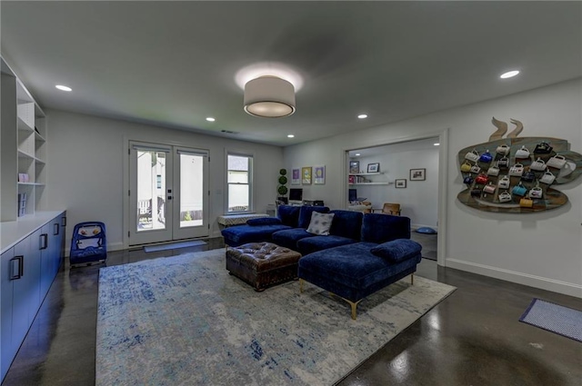 1892 Raven Hill Dr NE, Atlanta, GA 30319 - living room with concrete floors, french doors, recessed lighting, and baseboards