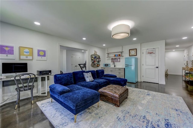 1892 Raven Hill Dr NE, Atlanta, GA 30319 - living room with a desk, recessed lighting, concrete floors, and baseboards