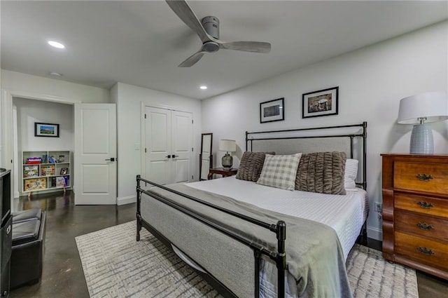 1892 Raven Hill Dr NE, Atlanta, GA 30319 - bedroom with finished concrete flooring, recessed lighting, baseboards, ceiling fan, and a closet