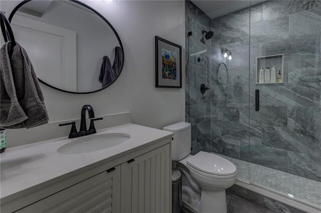 1892 Raven Hill Dr NE, Atlanta, GA 30319 - bathroom with toilet, a stall shower, and vanity