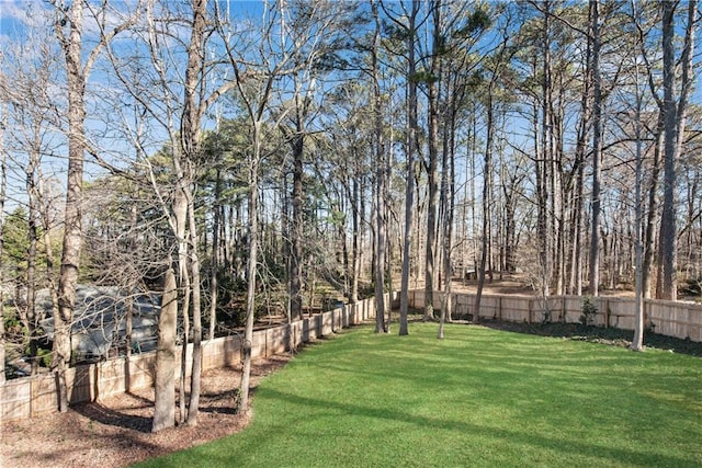 view of yard featuring a fenced backyard