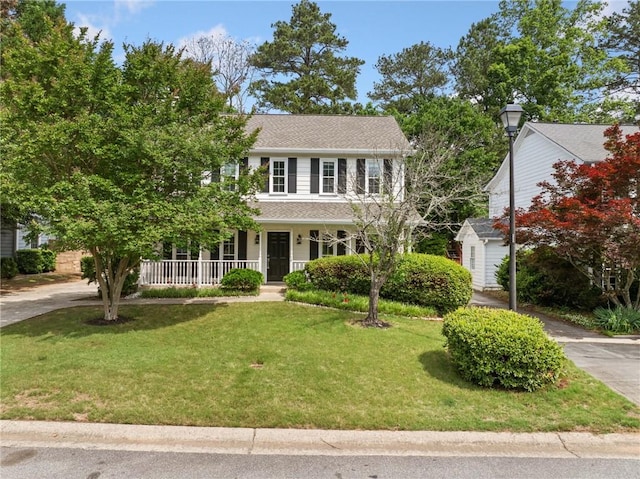 3405 Haverhill Rowe, Lawrenceville, GA 30044 - view of front of house featuring a porch and a front yard