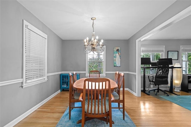 1959 Audubon Dr NE, Atlanta, GA 30329 - dining area with a chandelier, wood finished floors, and a desk
