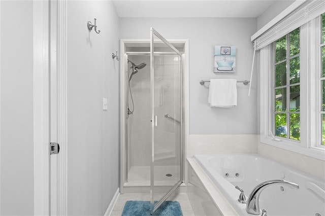 1959 Audubon Dr NE, Atlanta, GA 30329 - bathroom featuring healthy amount of natural light, a shower stall, and a jetted tub