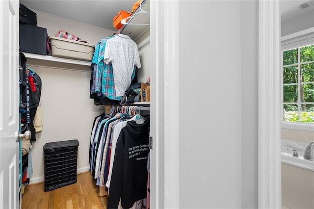 1959 Audubon Dr NE, Atlanta, GA 30329 - walk in closet with wood finished floors
