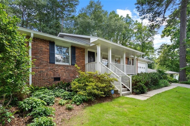 1959 Audubon Dr NE, Atlanta, GA 30329 - single story home featuring an attached garage, a porch, a front yard, crawl space, and brick siding