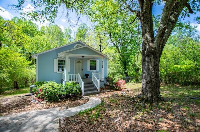 8211 Thompson St, Douglasville, GA 30134 - view of front of property featuring a porch and stucco siding