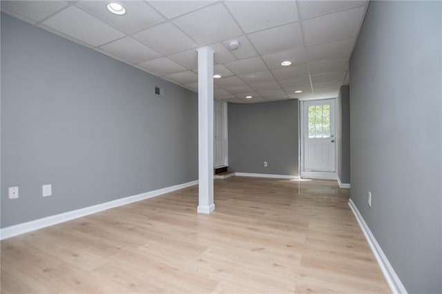 8211 Thompson St, Douglasville, GA 30134 - below grade area with visible vents, baseboards, light wood finished floors, recessed lighting, and a drop ceiling