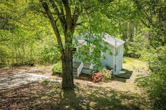 8211 Thompson St, Douglasville, GA 30134 - view of yard with a wooded view