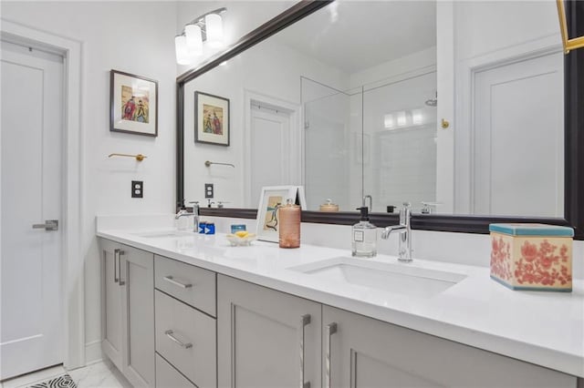 bathroom with vanity and a shower with door