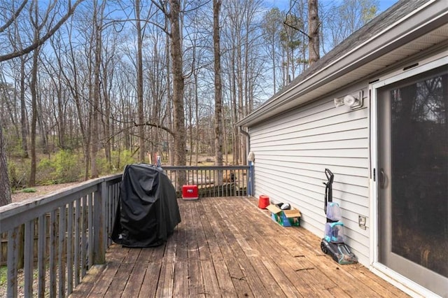 wooden terrace with grilling area