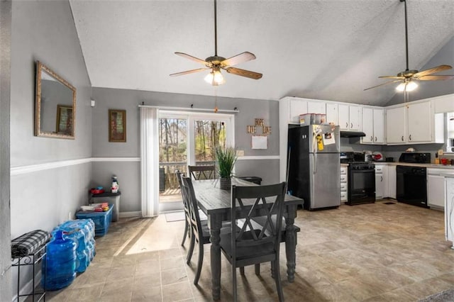 dining room with a textured ceiling, lofted ceiling, and a ceiling fan