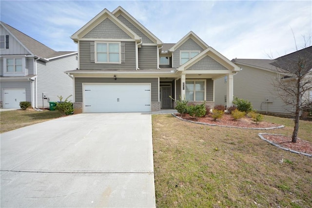 craftsman-style house with brick siding, driveway, a front yard, and a garage