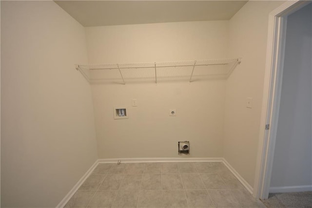 laundry area with washer hookup, laundry area, baseboards, and hookup for an electric dryer