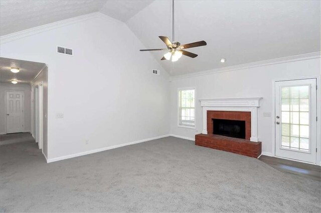 unfurnished living room featuring ornamental molding, a brick fireplace, and ceiling fan