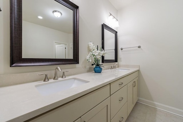 bathroom with vanity and tile patterned floors