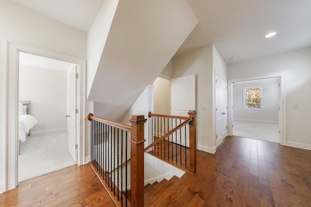 hallway with wood-type flooring