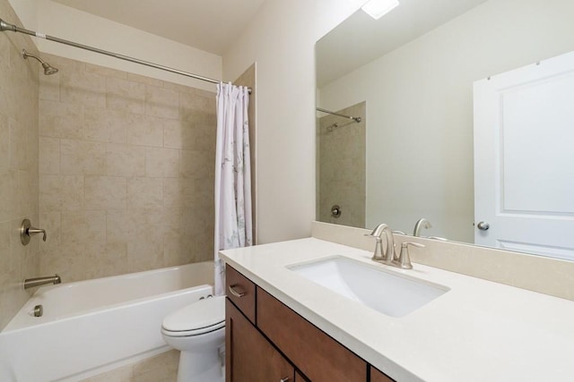 full bathroom with shower / bathtub combination with curtain, vanity, and toilet