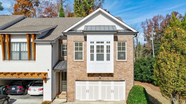 view of front of home with a garage