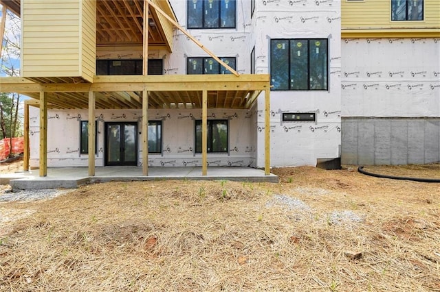 1430 Oconee Pass NE, Brookhaven, GA 30319 - rear view of house featuring french doors and a patio area