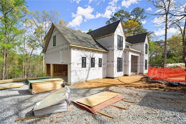 1430 Oconee Pass NE, Brookhaven, GA 30319 - view of property exterior with a shingled roof and stucco siding