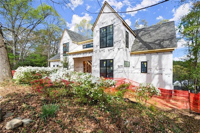 1430 Oconee Pass NE, Brookhaven, GA 30319 - view of front facade with a shingled roof and stucco siding