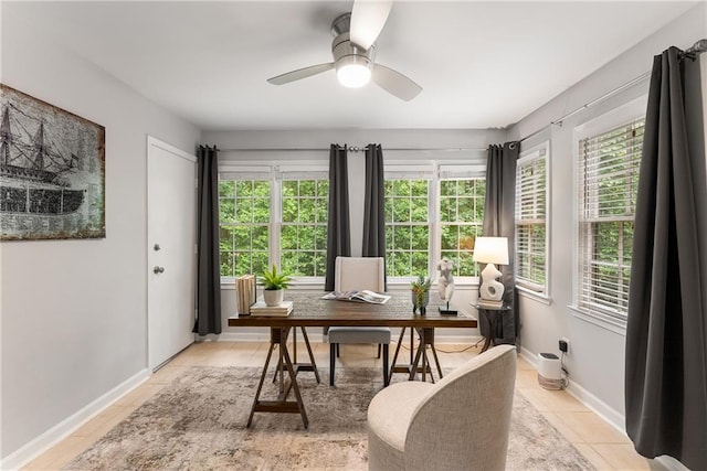 tiled office featuring plenty of natural light and ceiling fan