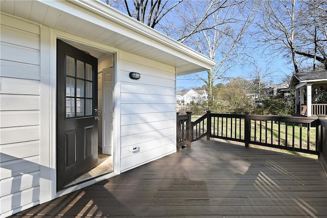 doorway to property featuring a deck