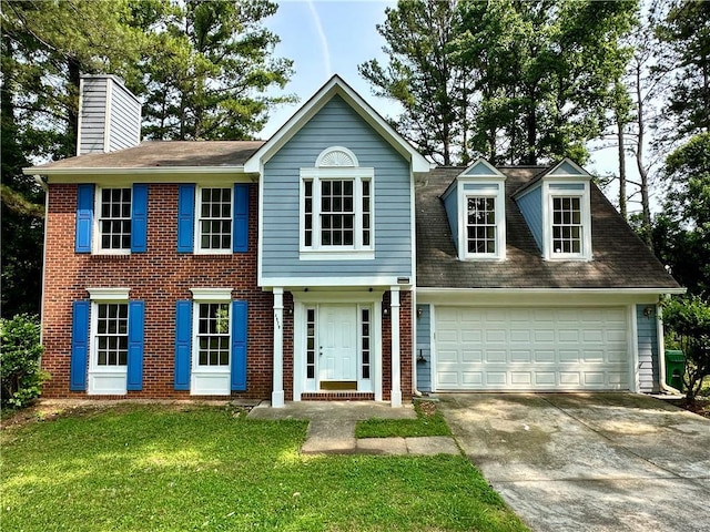 4970 Clubgreen Smt, Stone Mountain, GA 30088 - colonial-style house with driveway, a chimney, and brick siding