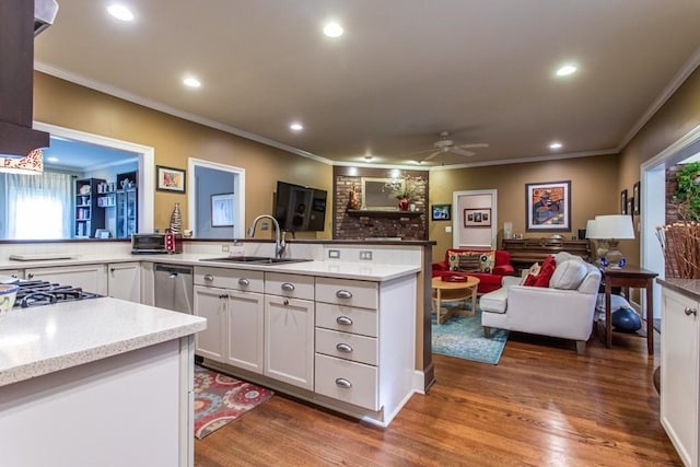 kitchen with ceiling fan, dark wood-type flooring, and white cabinetry