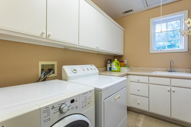 washroom featuring cabinets, independent washer and dryer, hookup for a washing machine, and sink