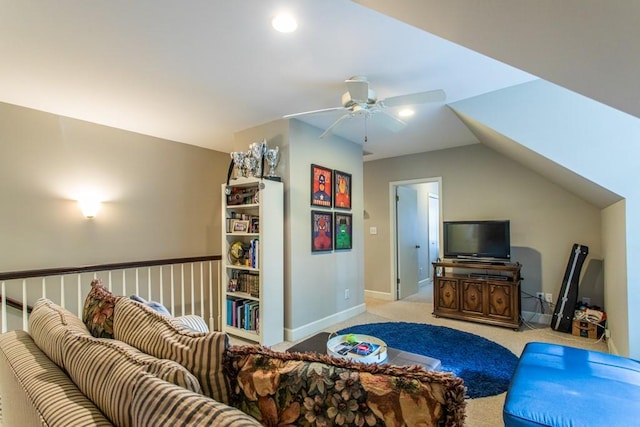 living room with vaulted ceiling, light colored carpet, and ceiling fan