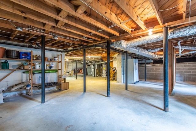 basement featuring water heater