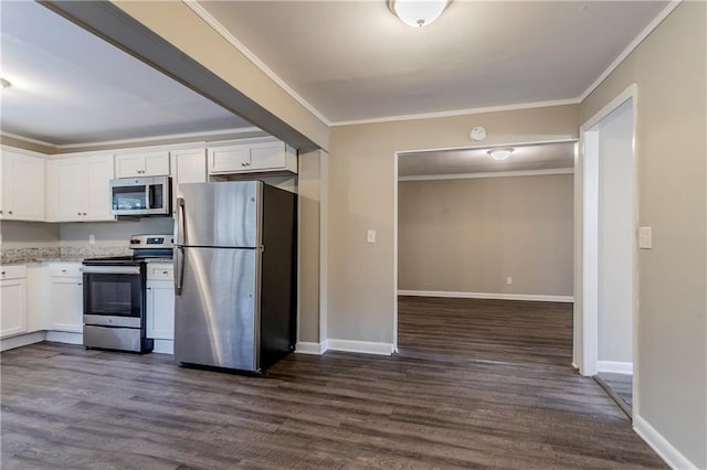 kitchen with white cabinetry, dark wood-type flooring, ornamental molding, and appliances with stainless steel finishes