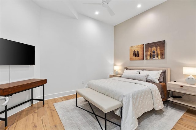 bedroom with recessed lighting, light wood-type flooring, baseboards, and ceiling fan