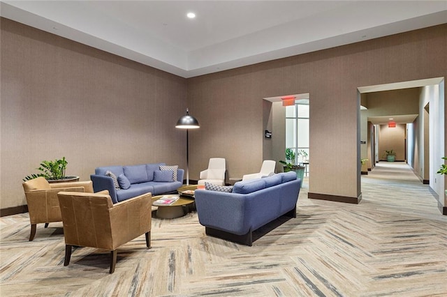 living room with recessed lighting and baseboards