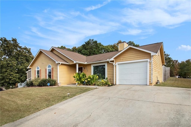 ranch-style house with a garage and a front lawn