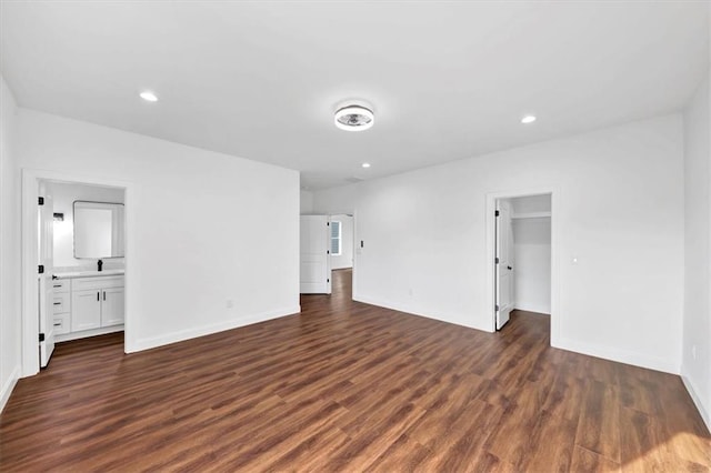 empty room featuring dark hardwood / wood-style flooring