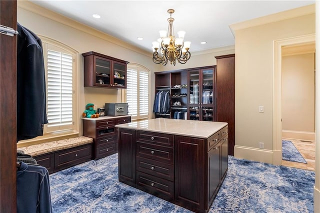 office with crown molding and a notable chandelier