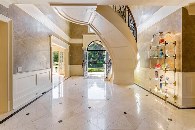 entryway featuring a high ceiling