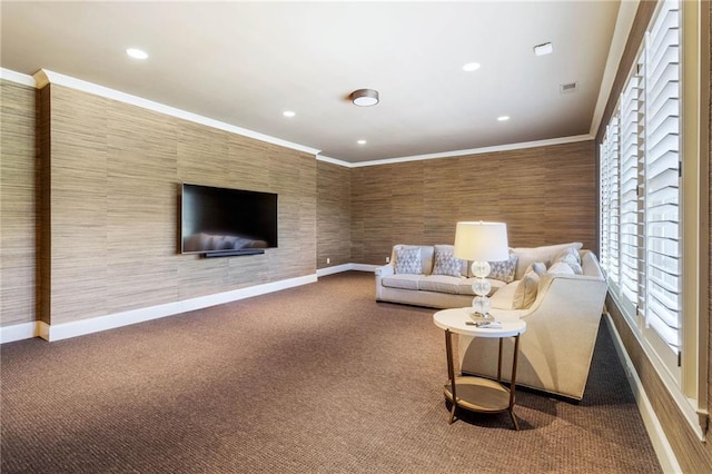 living room with ornamental molding and carpet floors