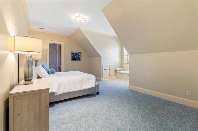 bedroom featuring lofted ceiling and carpet flooring