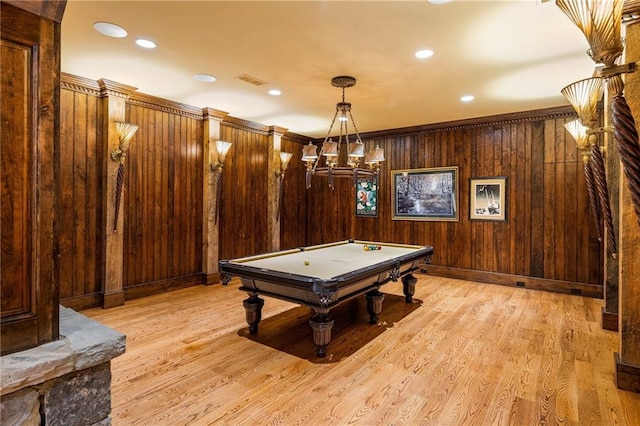 game room with crown molding, wooden walls, light wood-type flooring, and billiards