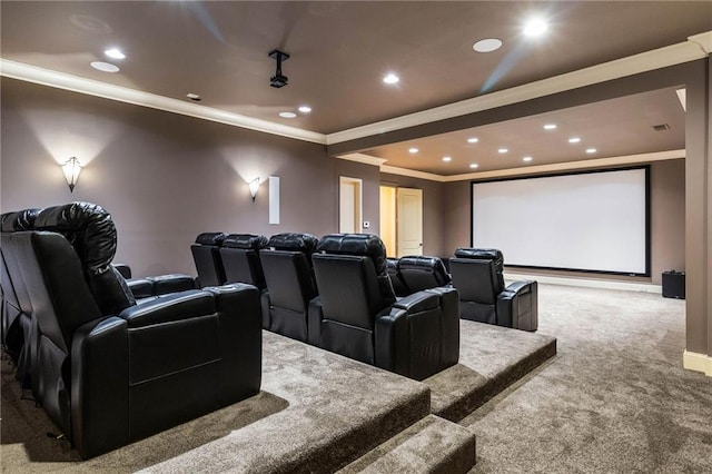 carpeted home theater featuring ornamental molding