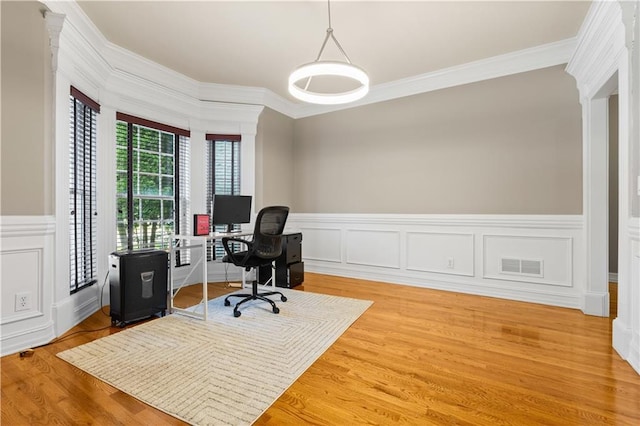 1360 Mount Mickinley Dr, Grayson, GA 30017 - office with crown molding, a wainscoted wall, a decorative wall, and light wood-style flooring