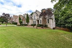 1360 Mount Mickinley Dr, Grayson, GA 30017 - view of front facade with a front lawn